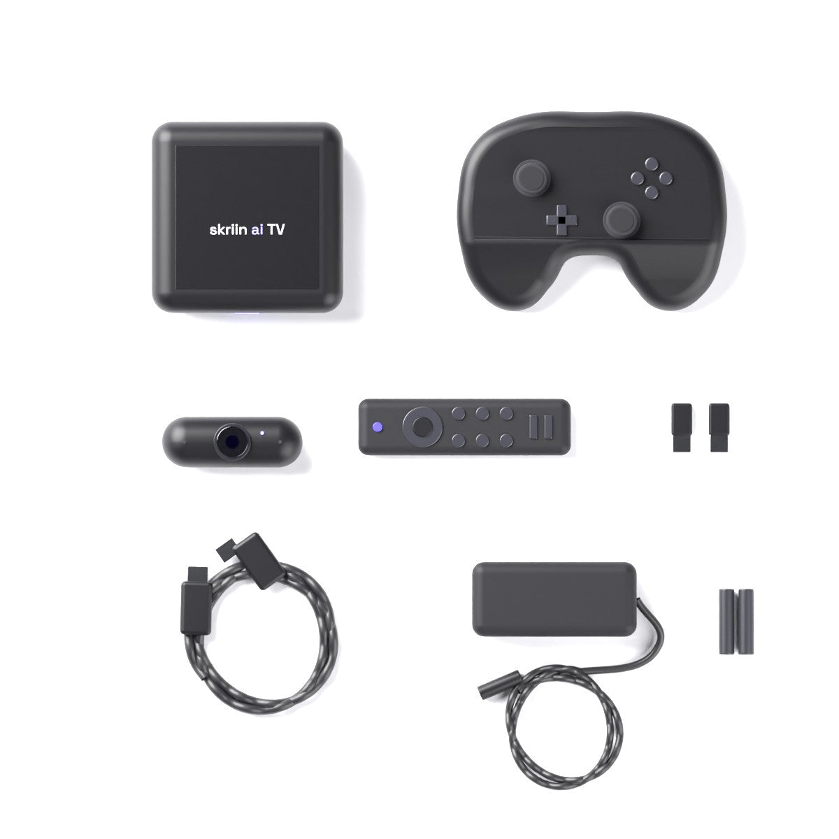 Everything in the box laid out: the skriin ai TV box, the controller, the camera, the short remote, two USB receivers, an HDMI cable, the power adapter and batteries